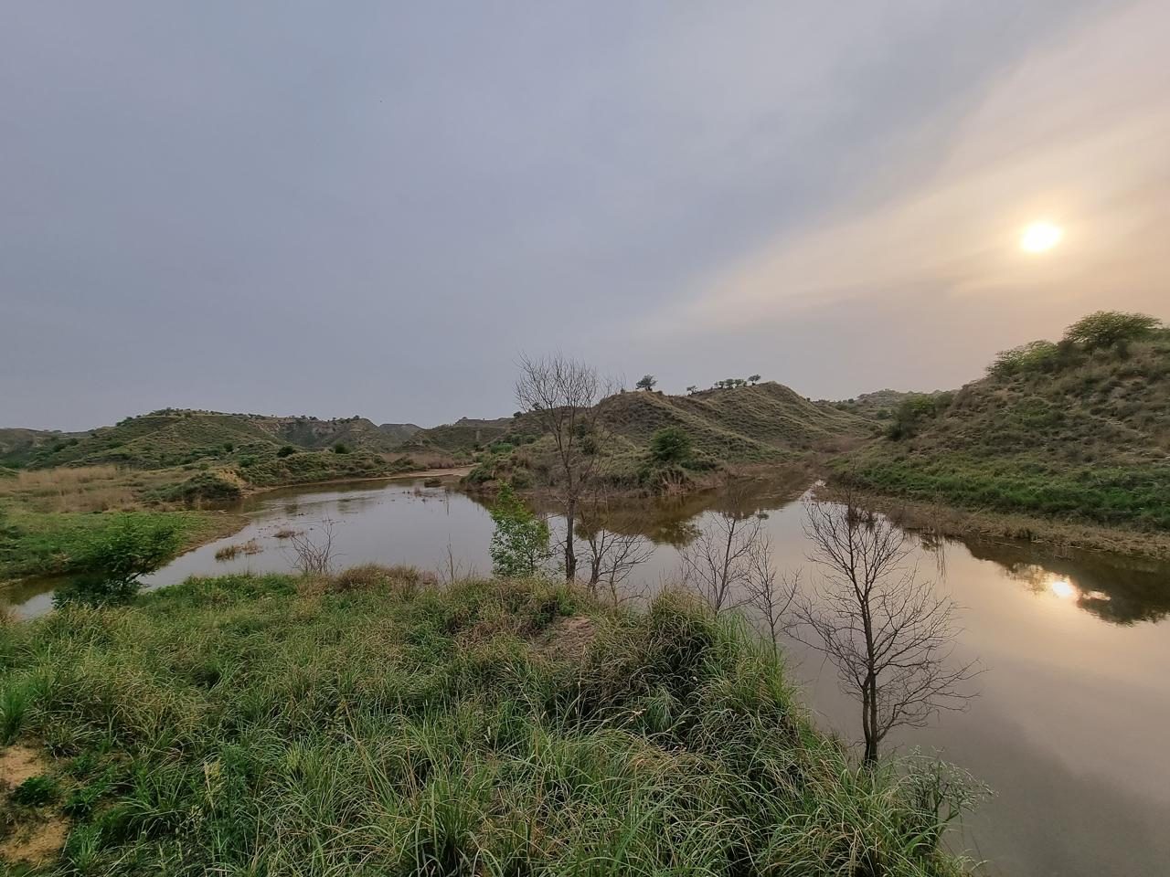 Fresh water dam at sunset